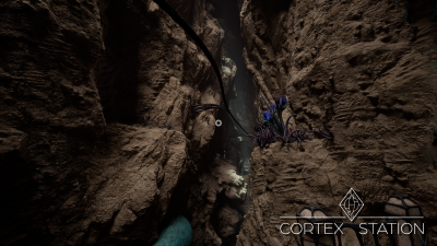 Screenshot from the vertical slice, depicting an alien mono rail track within the caves.